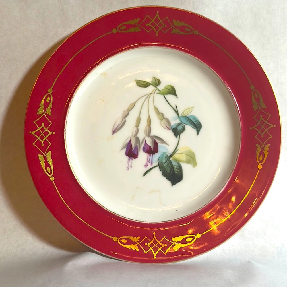 Porcelain plate fuchsia design with pink and gold rim. Looks great with Limoges.